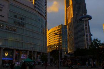 Sunset at Minato Mirai. Golden light gives life to grey buildings