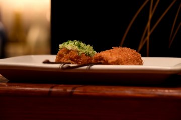 Deep-fried vegetables on small sticks