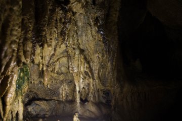 A limestone formation illuminated from below