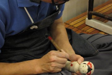 Detail is added to the doll
