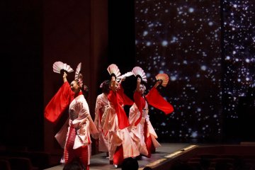 Dancers perform alongside film