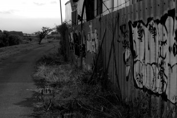 Graffiti on the wall of a construction company