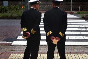Naval officers in Kure with sake cups