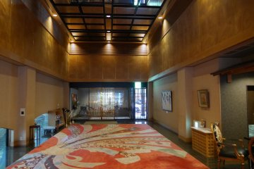 2-story entrance is impressive and decked out with interesting objects.