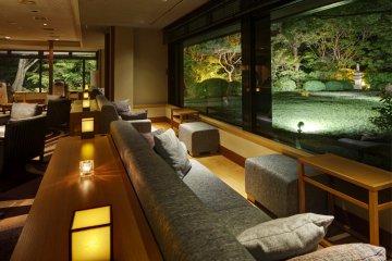 Common area on the ground floor for guests to rest and snack while looking out over the garden.