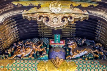   Amongst the numerous illustrations were these colorful tigers which beg a similar question to the imagined elephant: did the carver imagine these creatures as well or venture overseas to see them in real life? 