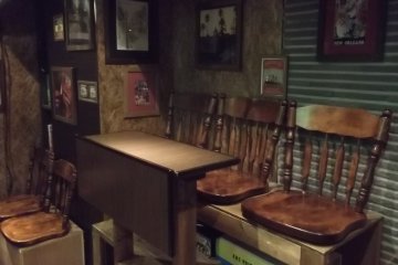 There are some seats at the back of the bar