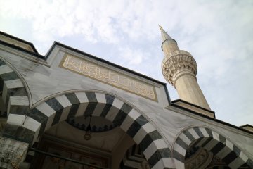 Looking up at a minaret