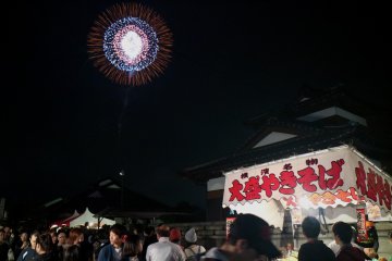 Japanese architecture and food stalls complementing the view