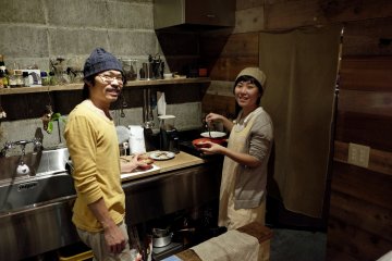 Owners, Mari and Takashi, preparing dinner for guests and friends
