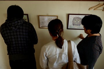 Watching masterpieces of their friends