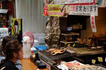 Have a seat and watch how the food is prepared