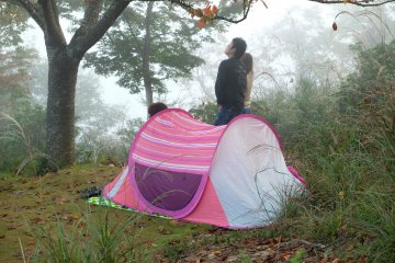 Some people bring tents to rest while they wait for sunrise