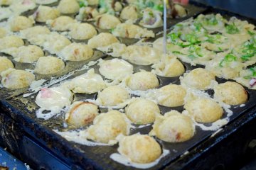 Some coupons can be redeemed for discounts on delicious local foods like takoyaki.
