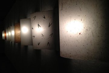 Hallway of wall mounted washi lamps