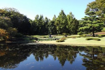 <p>A handful of staff patrol the garden unobtrusively on their bicycles</p>