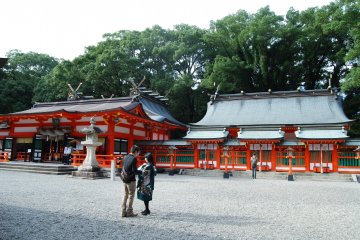 Young couple presenting their baby to the Kumano Kami
