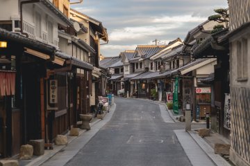 A quiet street lined with old buildings