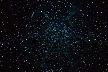 Standing inside the big Chrismas tree was like looking up at a night sky full of stars