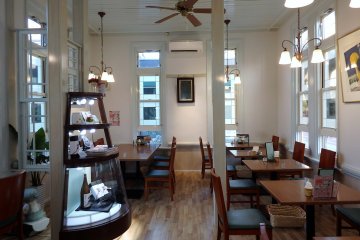 The indoor cafe space is comfortable and inviting.