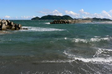 Concrete sea walls protect the beach