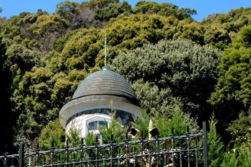 Dome-roofed turret with fish scale shingles
