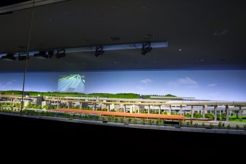 A massive working diorama that shows the detail of how trains run and work in the city