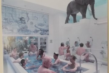A poster for I Luv Yu art bathhouse