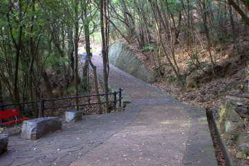 Here, where the stone benches are, is where you can take the side trail up to the castle ruins