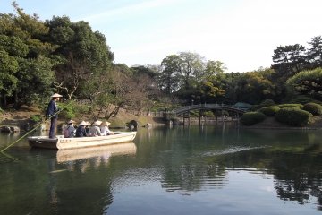 Punting on the lake in Ritsurin-koen