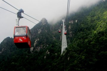 The Gozaisho Ropeway floats over the mountainous area