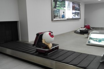 Kitaro's Father Medama-oyaji at Airport
