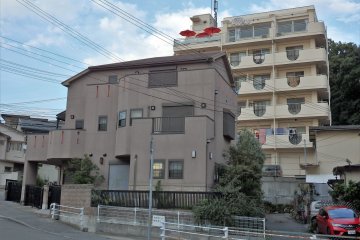 It is easy to miss the cafe. Look for the red umbrellas.
