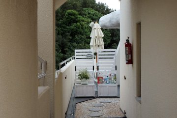 Follow the path to the cafe.