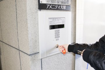 Security system with auto-lock and monitored entry-phone