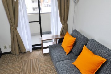 Spacious sitting room with a sofa, that can become a bed