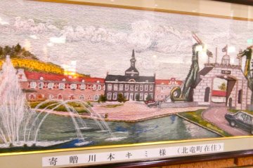 <p>If you're in the lobby, be sure to find this incredible portrait of the park done all by thread.</p>