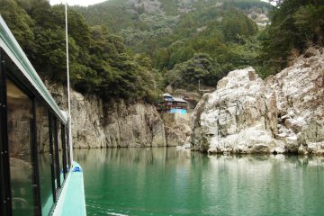 Gliding along the calm waters of the gorge with the destination in sight.