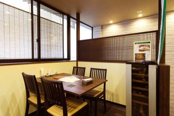 Table by the large airy window