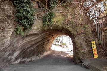Several minutes later you will pass under a narrow cutting in a cliff