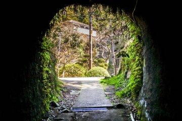This narrow tunnel leads into a quiet residential area