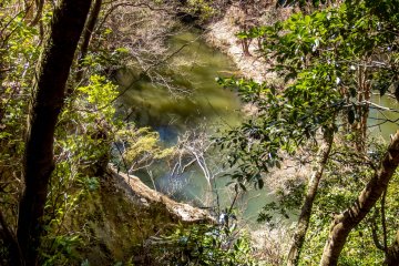  As you descend further down a large lake comes into sight