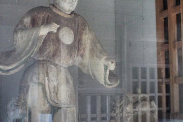 The bowman on the left