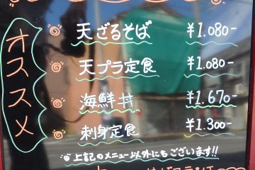A sign in front advertises lunch recommendations
