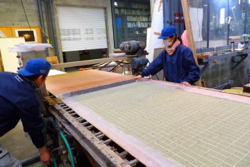 A roll of custom wallpaper in process