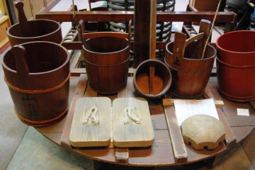 Old pots nicely arranged at the sake museum.
