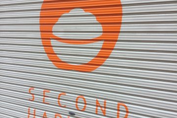 Le logo de Second Harvest est affectueusement appelé "l'homme de riz"