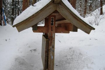 Looking a little lonely - in winter not many visitors dare to walk passed the gate of Mount Haguro