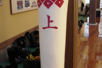 Large candle symbolising the "kami" group of Kurokawa's Noh guilds