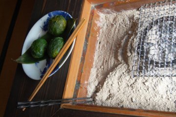 Grilling some onigiri yourself on this charcoal grill